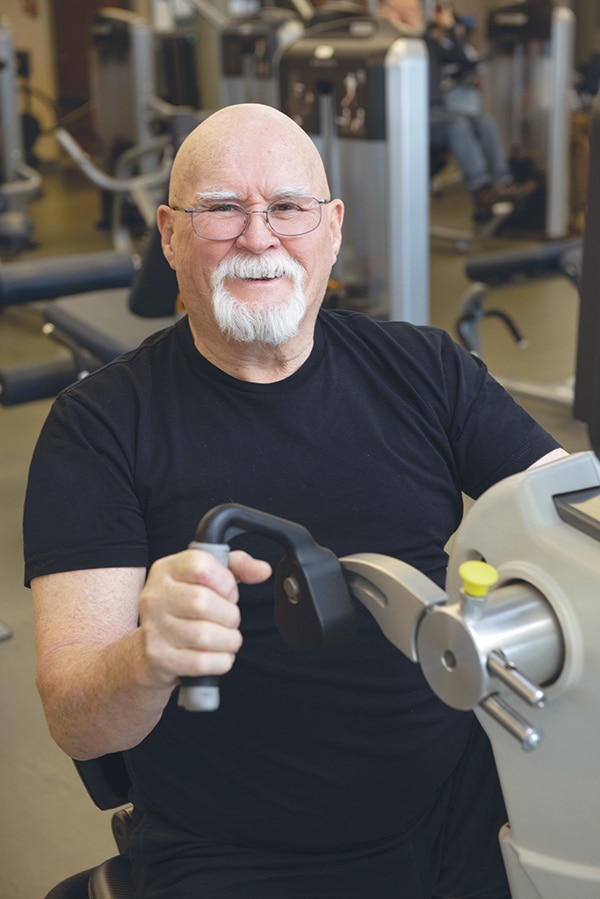 Man with diabetes exercises in a gym
