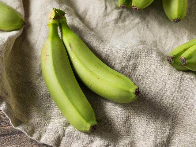 Green bananas as a healthy option for snacking in the car.