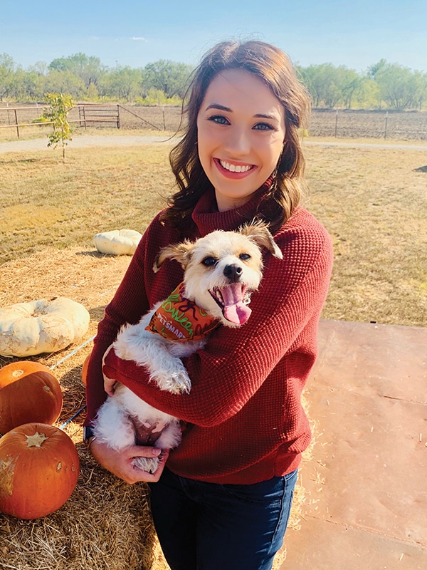 Awake brain surgery patient Jenna Schardt with her dog. 